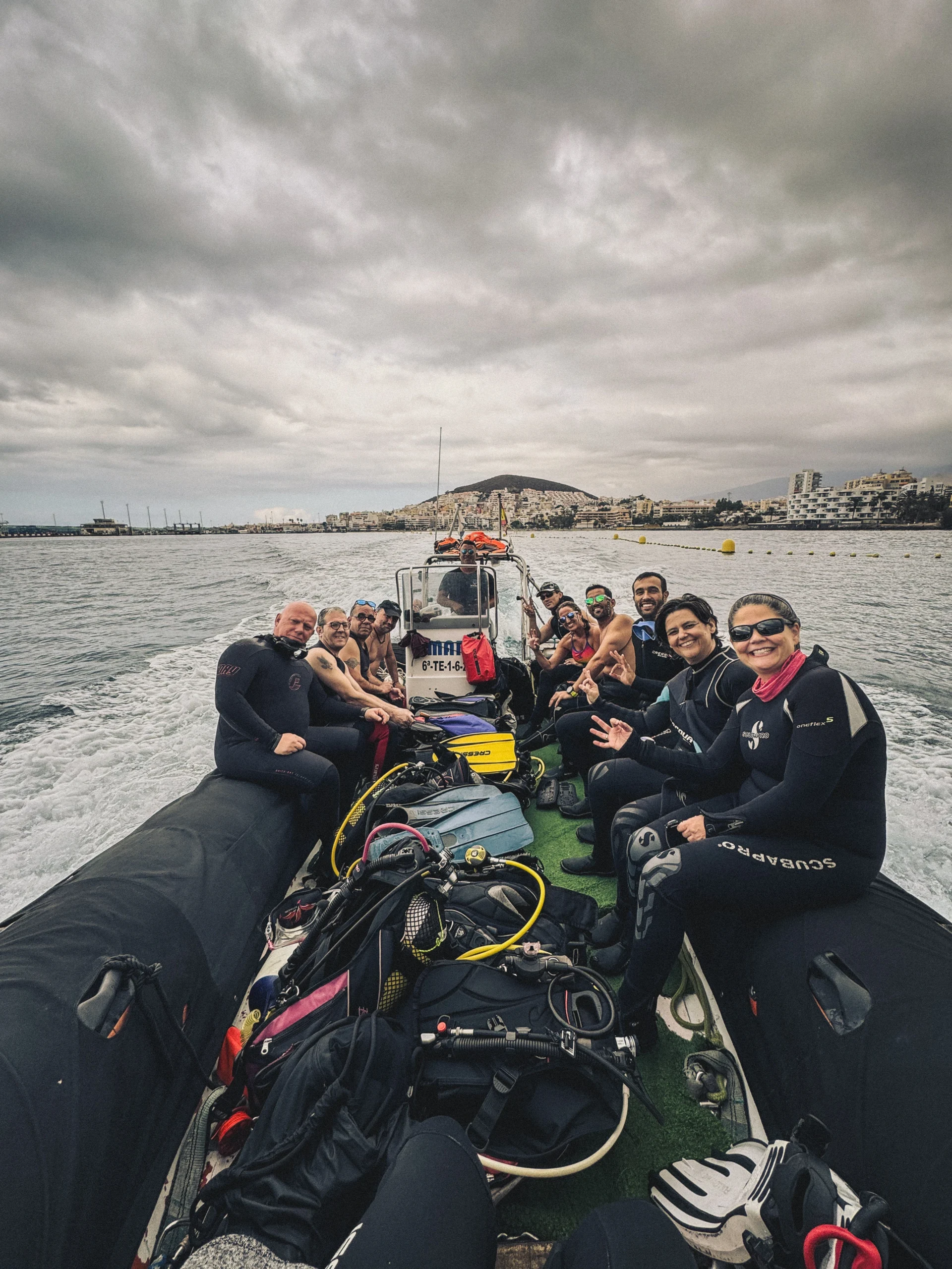 Scuba divers aboard the boat heading out to Palm Mar Wall dive site in South Tenerife
